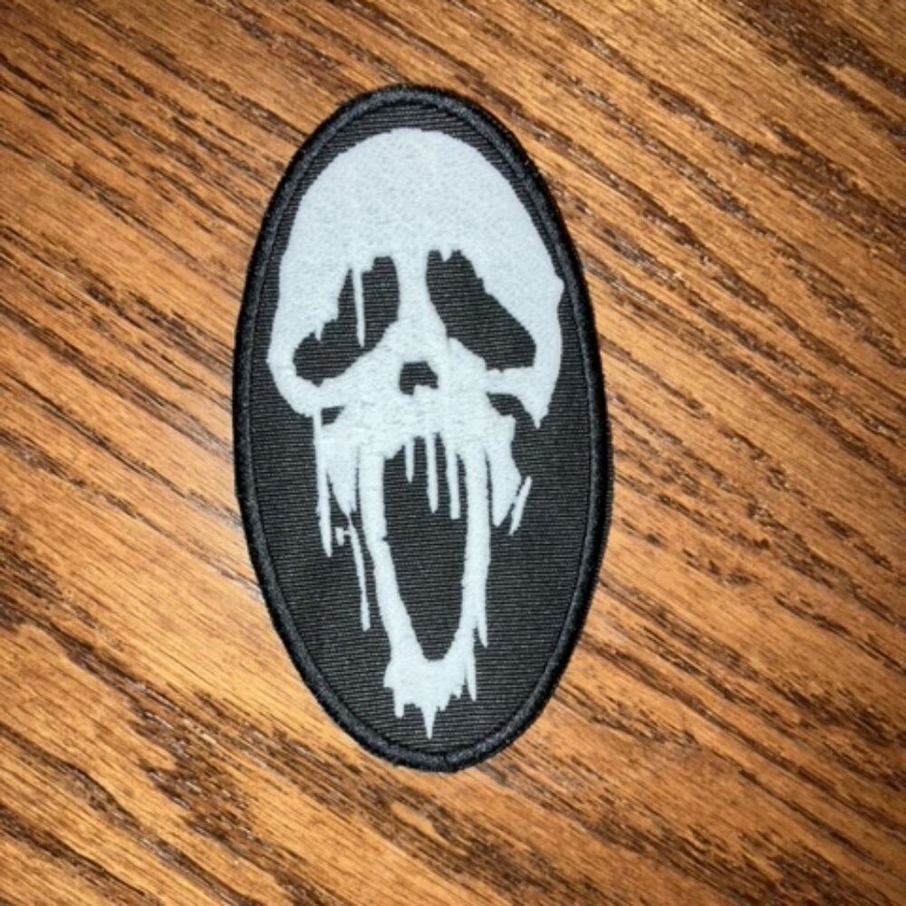 Ghostface melting mask patch that glows green at night
